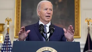President Joe Biden speaking in the State Dining Room of the White House
