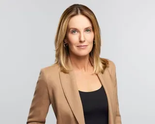 a woman smiles