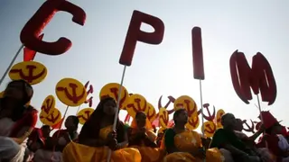 REUTERS Supporters of the Communist Party of India (Marxist) (CPI-M) attend a public rally addressed by chief Prakash Karat, ahead of their four-day-long state conference in Agartala, capital of India's northeastern state of Tripura, January 29, 2012.