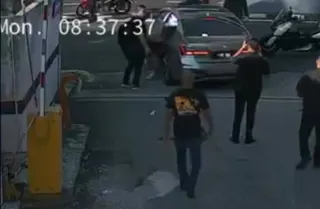 Screengrab from CCTV footage showing onlookers rushing to the accident scene. SOCIAL MEDIA