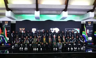 Soccer Football -FIFA World Cup 2026 - South Africa coach Hugo Broos announces his World Cup squad - Sefako Makgatho Presidential Guest House, Pretoria, South Africa - May 27, 2026 South Africa coach Hugo Broos, South Africa president Cyril Ramaphosa and South African football association president Danny Jordaan with the squad during the announcement REUTERS/Siphiwe Sibeko