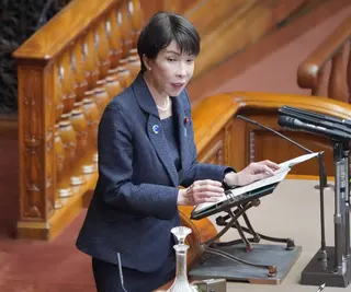 Prime Minister Sanae Takaichi answers questions during an Upper House session at parliament in Tokyo on Friday.