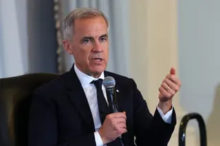 a man speaks into a microphone