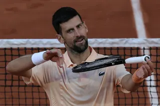Serbia’s Novak Djokovic celebrates his victory over France’s Valentin Royer during their men’s singles match on day 4 of the French Open at the Roland-Garros Complex in Paris May 27, 2026. — AFP pic