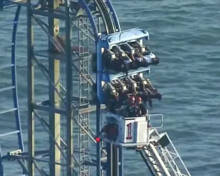 People stuck on a roller coaster