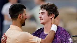 Novak Djokovic and Joao Fonseca share a warm embrace after their French Open match
