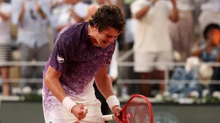 Joao Fonseca celebrates beating Novak Djokovic at the 2026 French Open