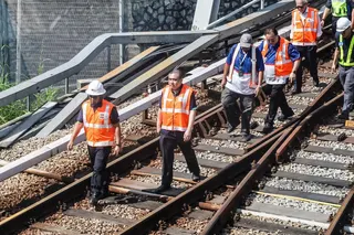 Transport Minister Anthony Loke (second from left) inspecting the rail near the Chan Sow Lin LRT station following train derailment yesterday. NSTP/NABILA ADLINA AZAHARI