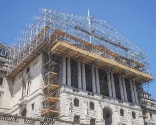 The Bank of England in the City of London is covered in scaffolding during renovation to its facade
