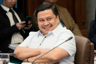 Senator Jinggoy Estrada smiles during a break in investigations on flood-control projects at the Senate Blue Ribbon committee in Pasay city, Philippines in 2025. Photo: AP