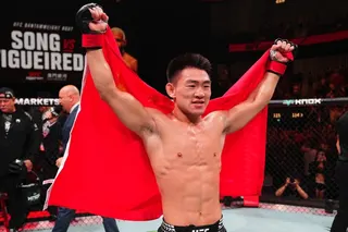 Song Yadong celebrates after beating Deiveson Figueiredo by submission in their bantamweight bout in Macau. Photo: Getty Images