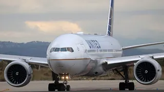 United Airlines plane flying in the sky