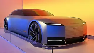 Getty Images  A blue Jaguar Type 00 concept car is displayed at a car show