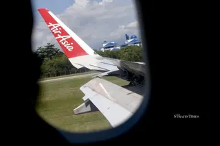 AirAsia is reviewing its policies and procedures on specialised child restraint devices to ensure greater clarity and consistency.  - NSTP file pic