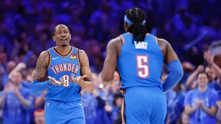 Oklahoma City Thunder players react during a playoff game