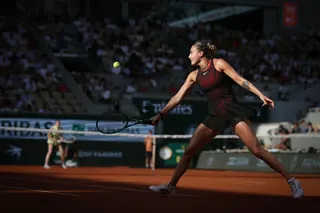 Aryna Sabalenka in a lightweight black dress accented with sparkling necklaces. — AFP pic