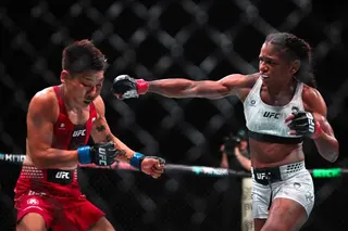 Angela Hill (right) punches China’s Xiong Jingnan during their bout at UFC Fight Night at the Galaxy Arena. Photo: AFP