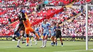 Khadija Shaw heads the opening goal for Manchester City