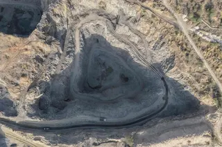 This aerial photograph taken on May 19, 2026 shows an open-cast stone quarry in the Aravalli mountain range in Rajasthan’s Neem ka Thana town. Dizzyingly deep pits from large-scale mining scar India’s ancient Aravalli mountains, threatening the future of a forested buffer that New Delhi relies on for protection from furnace-hot desert winds. — AFP pic