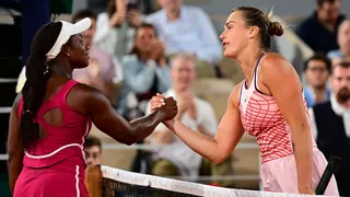 Sloane Stephens and Aryna Sabalenka shake hands after their night match in 2023