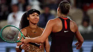 Naomi Osaka and Aryna Sabalenka embrace at the net after their 2026 French Open match