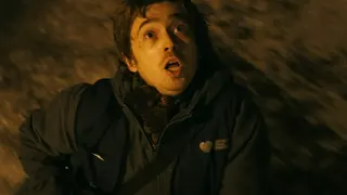 Protagonist running and looking up to the sky.