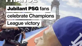 Jubilant PSG fans celebrate Champions League victory by the Eiffel Tower