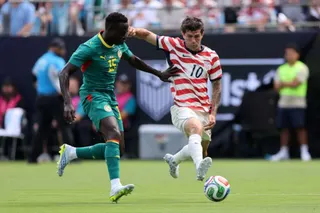 CHARLOTTE, NORTH CAROLINA - MAY 31: Christian Pulisic of United States and Krepin Diatta of Senegal compete for the ball during the international friendly match between United States and Senegal at Bank of America Stadium on May 31, 2026 in Charlotte, North Carolina. Jamie Squire/Getty Images/AFP (Photo by JAMIE SQUIRE / GETTY IMAGES NORTH AMERICA / Getty Images via AFP)