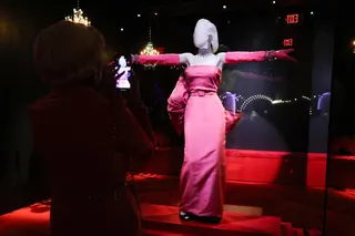 The iconic pink dress worn by Monroe during her performance of 'Diamonds Are a Girl's Best Friend', on display at the Academy Museum