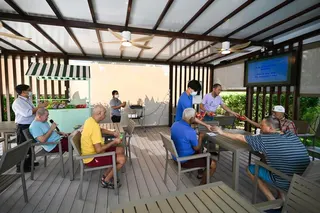 Residents singing karaoke in the S.E.E.D Garden at SANH (Buangkok).