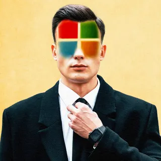 Image may contain Face Head Person Photography Portrait Adult Accessories Formal Wear Tie Clothing and Suit