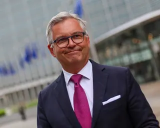 Magnus Brunner outside the EU parliament in Brussels