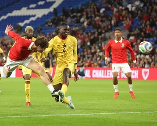Lewis Koumas heads home a late equaliser for Wales against Ghana