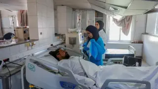 Reuters Medics treat a patient on a ward at Jabal Amel hospital in the city of Tyre, southern Lebanon, following Israeli air strikes on nearby buildings (2 June 2026)