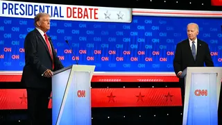 President Joe Biden and former President Donald Trump seated at debate podiums in CNN studios in Atlanta