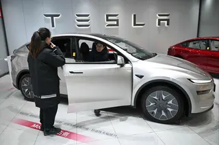 A Tesla vehicle on display at a Beijing showroom. Deliveries from the carmaker’s Shanghai plant hit a 2026 high in May. Photo: AFP