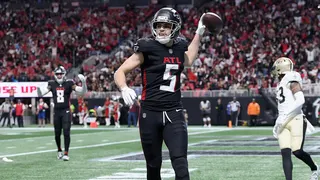 Drake London celebrating a touchdown at Mercedes-Benz Stadium in Atlanta