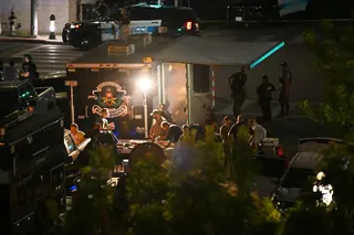 Law enforcement respond after a man barricaded himself inside a building with hostages. The stand-off in downtown Bakersfield began on Tuesday afternoon when officers responded to a call of a bomb threat. Photo: AP