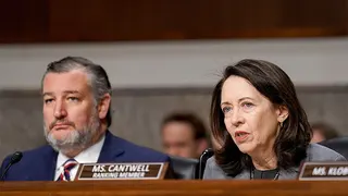 Senator Ted Cruz and Senator Maria Cantwell seated during a Senate Commerce Committee hearing