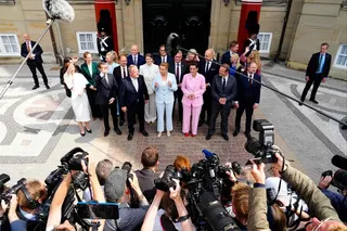 (First row, from left) Denmark’s Foreign Minister Lars Loekke Rasmussen of the Moderates party, Denmark’s Prime Minister Mette Frederiksen of the Social Democrats party, Pia Olsen Dyhr of the Socialist People’s Party and Martin Lidegaard of Denmark’s The Social Liberal Party address the media outside Amalienborg Castle in Copenhagen on Wednesday. Photo: AFP