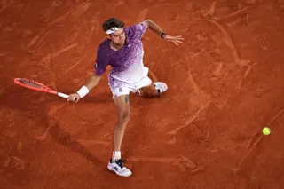 Flavio Cobolli plays a forehand against Félix Auger-Aliassime