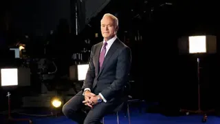 Getty Images Scott Pelley sits in a chair posing for a portrait