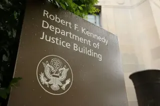 Getty Images The sign outside the DOJ is brown with an insignia. Its words say: "Robert F Kennedy Department of Justice building"