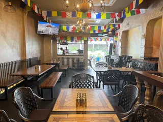 Decked in colourful prayer flags and murals, the restaurant is the ideal place to hide from the afternoon heat. — Picture by Lee Khang Yi