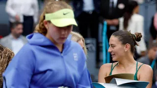 Ukraine's Marta Kostyuk (right) and Russia's Mirra Andreeva in the Madrid Open trophy ceremony