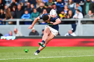 Jake Connor kicks over for Leeds