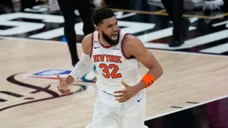 New York Knicks center Karl-Anthony Towns looking for a call during NBA Finals game.