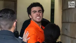 Luigi Mangione shouting while officers restrain him outside Blair County Courthouse