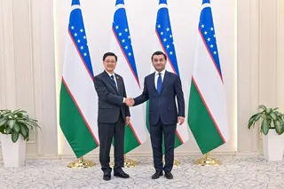 Chief Executive John Lee alongside Uzbekistan’s Foreign Affairs Minister Bakhtiyor Saidov. Photo: Handout