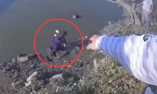 女警奮不顧身跳下水救人。（圖／翻攝畫面）